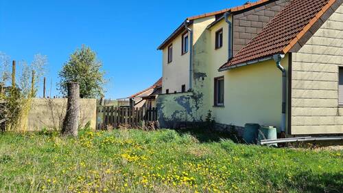 Traufseite mit linkem Garten - Einfamilienhaus mit 150,00 m&sup2; in Markvippach zum Kaufen