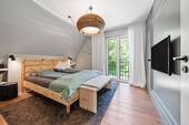 Schlafzimmer mit begehbarem Kleiderschrank - 