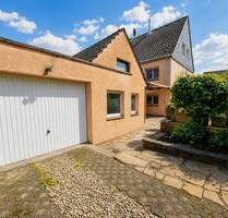 Sanierungsbedürftige Doppelhaushälfte mit Anbau und großem Potenzial in begehrter Lage von Mülheim-Saarn!