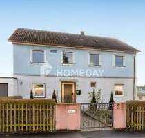 Familienfreundliches Einfamilienhaus mit 7 Zimmern und zwei Garagen in Gaibach - Volkach