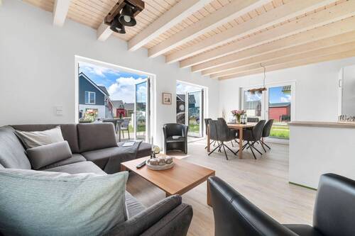 Wohnzimmer - 4 Zimmer Einfamilienhaus zum Kaufen in Büsum