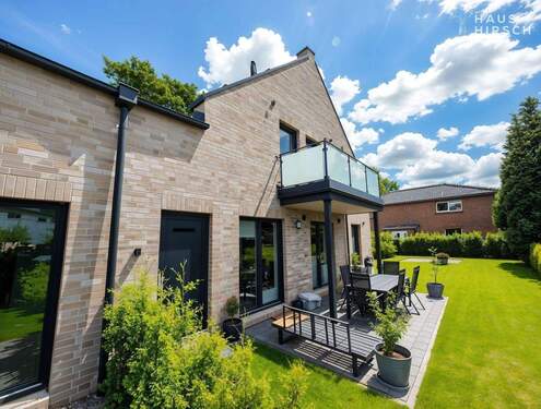 Hausansicht - Attraktive Dachgeschoss-Neubauwohnung - Park und See vor der Tür!