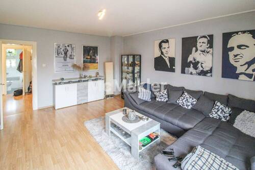 Wohnzimmer Wohnung 1 - Mehrfamilienhaus, Wohnhaus mit 218,00 m&sup2; in Duisburg zum Kaufen