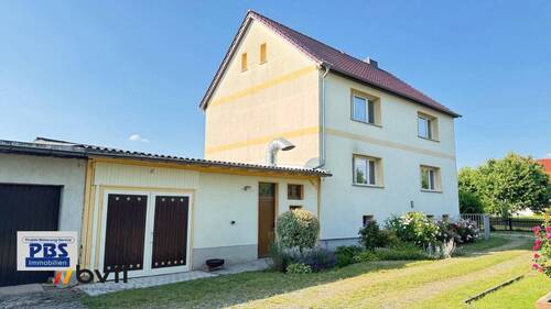 Zufahrt zum Grundstück u. Garagen - Einfamilienhaus mit 150,00 m² in Nobitz zum Kaufen