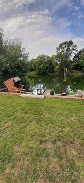Blick von der Terrasse - Einfamilienhaus auf Wassergrundstück