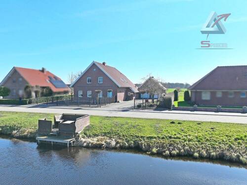 tolles Zweifamilienhaus am Kanal - Haus in Uplengen Nordgeorgsfehn