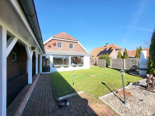 Gartenansicht - Mehrfamilienhaus, Wohnhaus mit 212,00 m&sup2; in Uplengen / Nordgeorgsfehn zum Kaufen