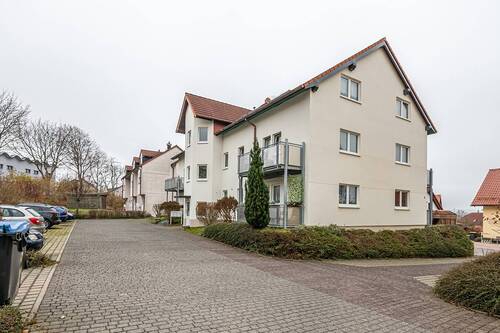 Seitenansicht - Einsteigerinvestment mit Entwicklungspotential in Stolpen. DG-ETW mit Fußbodenhzg. und Stellplatz.