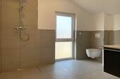 Bad mit ebenerdiger Dusche - 