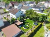 Außenansicht mit Garten - Etagenwohnung mit 95,00 m² in Stadtallendorf zum Kaufen