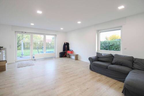 Wohnzimmer - Mehrfamilienhaus, Wohnhaus mit 160,30 m² in Neuenkirchen zum Kaufen