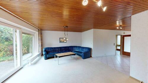 Wohnzimmer - Doppelhaushälfte mit 121,00 m² in Hasloh zum Kaufen