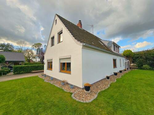 Seitenansicht - 5 Zimmer Mehrfamilienhaus, Wohnhaus in Cappel