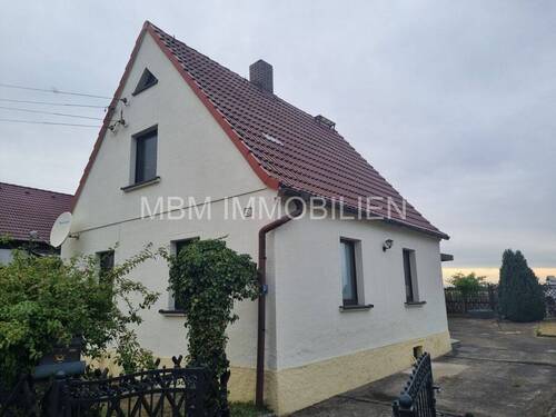 Bild 2 - 4 Zimmer Einfamilienhaus zum Kaufen in Nünchritz