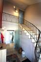Eingangsbereich mit Treppe ins Obergeschoss - 