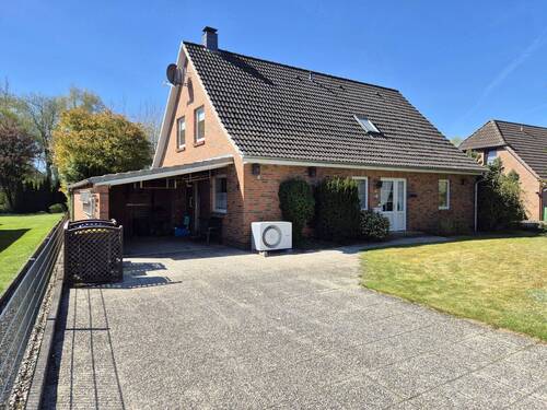 Vorderansicht - Großes Einfamilienhaus mit Wärmepumpe, Wintergarten und schönem Grundstück in Christiansholm