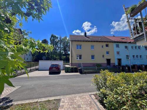 Hausansicht - Vollvermietetes 3-Familienhaus mit Baugrundstück 