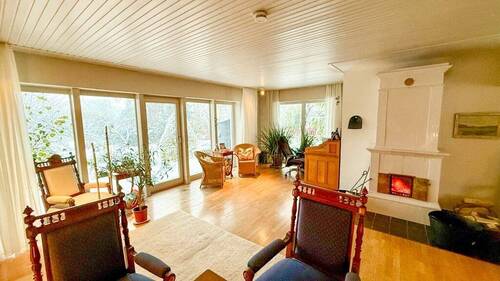 Wohn- und Esszimmer mit Kachelofen - 4 Zimmer Einfamilienhaus in Eggebek