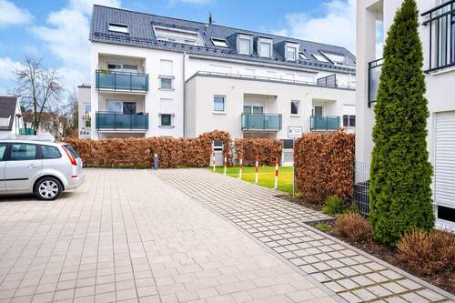 Außenansicht - Moderne 2-Zimmer-Erdgeschosswohnung mit West-Terrasse, Garten und hochwertiger Ausstattung