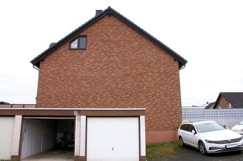 Seitenansicht - 4 Zimmer Mehrfamilienhaus, Wohnhaus zum Kaufen in Hennef (Sieg)