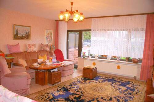 Wohnzimmer EG - Mehrfamilienhaus, Wohnhaus mit 122,00 m&sup2; in Hennef (Sieg) zum Kaufen