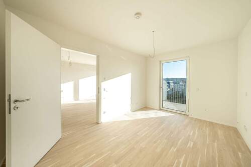 Schlafzimmer mit Zugang zum Balkon - 