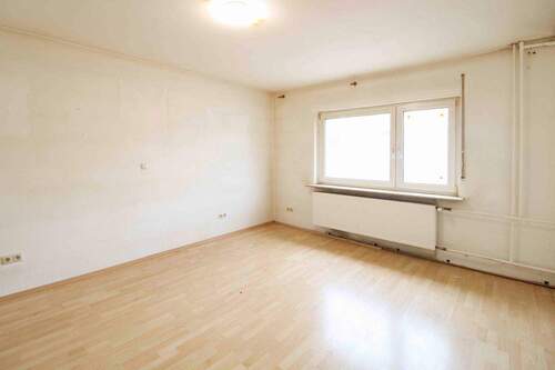 Wohnzimmer EG - Einfamilienhaus mit 145,00 m² in Flörsheim am Main zum Kaufen
