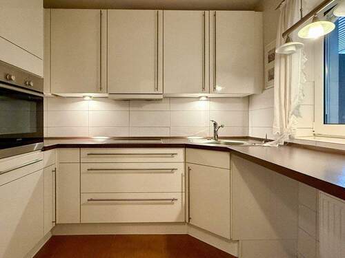 Küche mit Einbauküche - Etagenwohnung mit 79,00 m&sup2; in Husum zum Kaufen