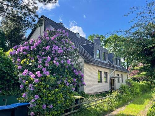 Außenansicht - Erdgeschosswohnung mit Gartenzugang in ruhiger Anliegerstraße