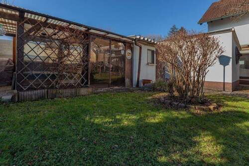 Überdachter Freisitz - Einfamilienhaus mit 240,50 m&sup2; in Gröbenzell zum Kaufen