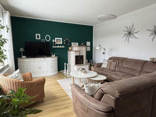 Wohnzimmer mit Kamin - 