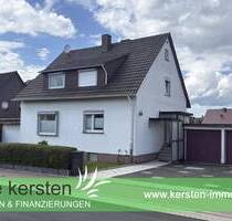 Wohnen, vermieten oder beides - Flexibles Zweifamilienhaus mit schönem Garten in Fuldabrück-Dörnhagen zu verkaufen!