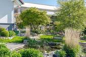 schön angelegter Garten - Einfamilienhaus mit 250,00 m&sup2; in Neu-Anspach zum Kaufen