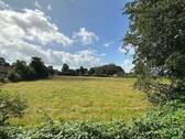 Blick vom Balkon ins grüne - Etagenwohnung mit 74,80 m² in Mildstedt zum Kaufen