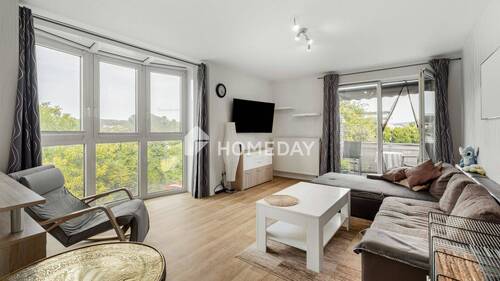 Wohnzimmer 1 - Attraktive 3-Zimmer-Wohnung mit Balkon und Top-Energiekennwert