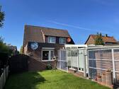 Rückansicht - 6 Zimmer Mehrfamilienhaus, Wohnhaus in Schortens