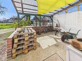 Terrasse Richtung Süd-West bei Wohnen Bestandshaus im EG - 