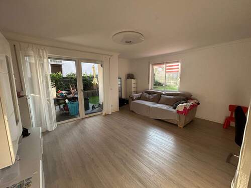 Wohnzimmer - Großzügige Erdgeschosswohnung mit Terrasse in Bielefeld!