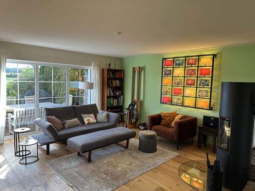 Wohnzimmer mit Kaminofen - 