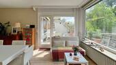 Der helle Wohn- und Essbereich als Herzstück der Wohnung - 2 Zimmer Etagenwohnung zum Kaufen in Freiburg i. Br. / Tiengen