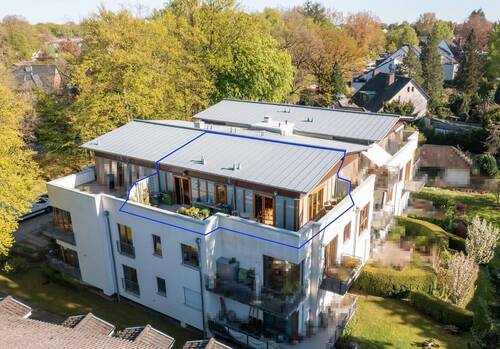 Luftaufnahme - Modern und effizient - exklusive Dachterrassenwohnung mit Blick ins Grüne!