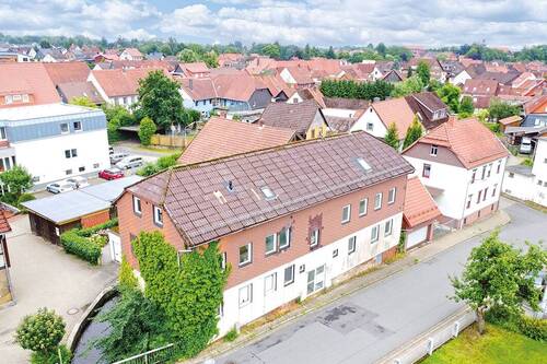 Luftaufnahme Frontansicht - 1 Zimmer Mehrfamilienhaus, Wohnhaus in Herzberg am Harz