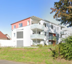 Objektansicht - Eigentumswohnung mit Terrasse und Carport
