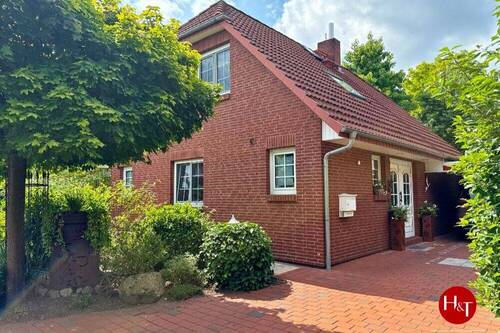 Verkauf Haus Stuhr-Groß Mackenstedt Hechler & Twachtmann Immobilien GmbH - Gemütlich, modern und gepflegt! Einfamilienhaus mit Carport