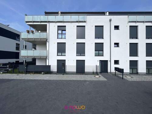 Hausansicht - Ankommen & Wohlfühlen: 4-Zimmer-Neubau mit offenen Wohnbereich, moderne Küche & Wärmepumpe (A+)