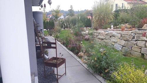 Süd-/Ostseite Garten - 3 Zimmer Bungalow in Bad Griesbach i.Rottal