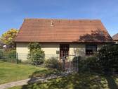 Außenansicht - Wohnen im Bungalowstil in Alt-Uesen!
