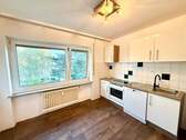 Geräumige Küche mit Platz für eine Essecke 1 - Einfamilienhaus in Nürnberg zum Kaufen