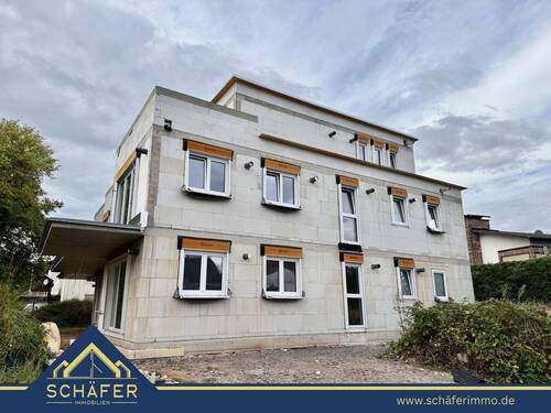 Titelbild - Erstbezug: Hochwertige 2 ZKB-Neubauwohnung in Niederlosheim zu verkaufen