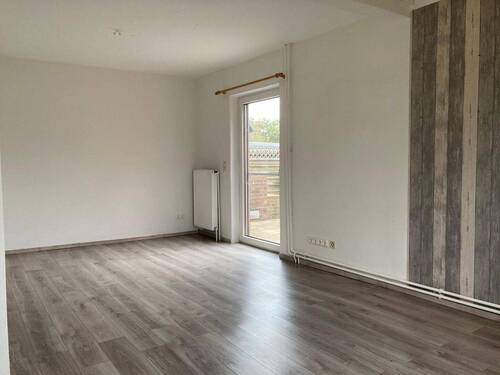 Wohnbereich mit Ausgang zur Terrasse - 